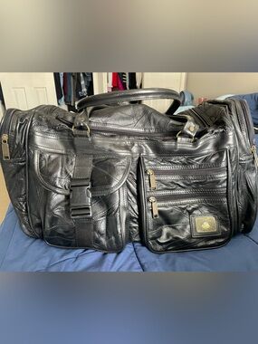 PIONEER Black Quilted Leather Duffel with Gold Hardware